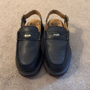 Doc Martens sling back loafers.